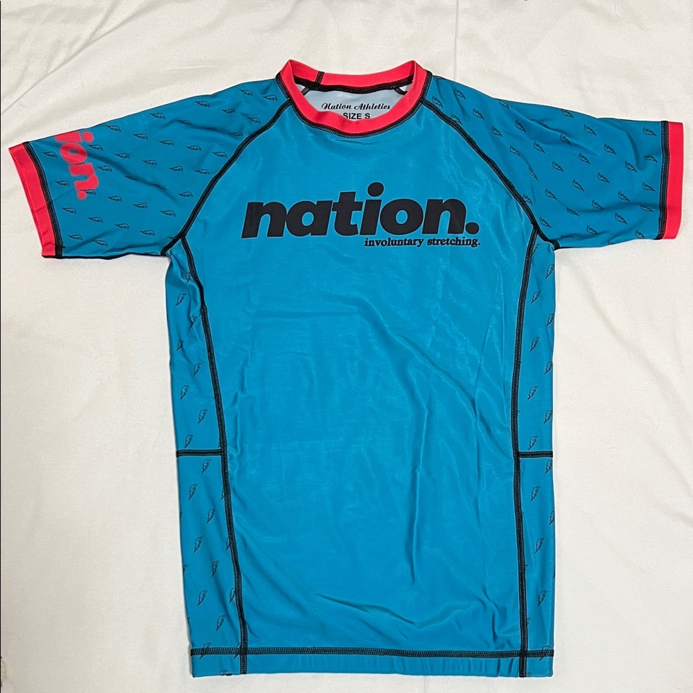 Nation Men's Blue Short-Sleeve Rash Guard with Red Trim